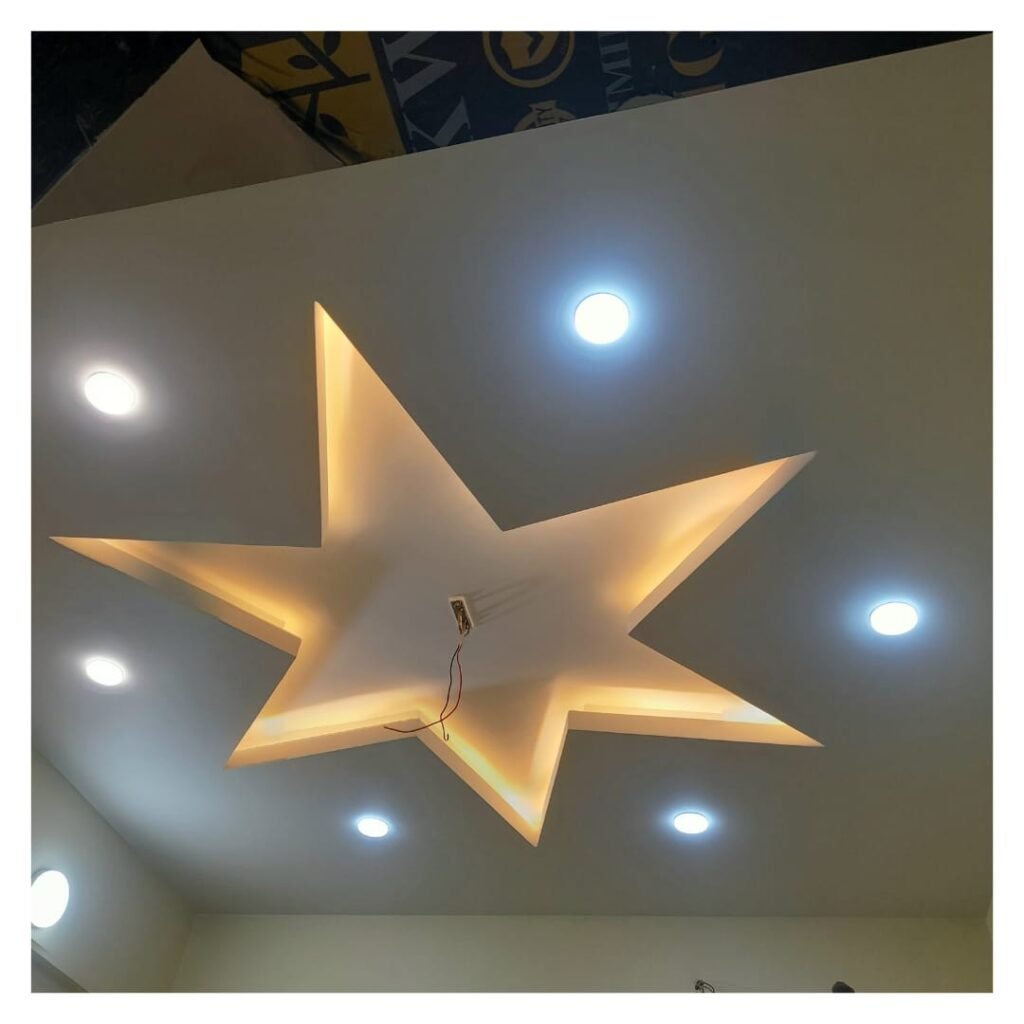 ​Completed star shape gypsum false ceiling execution with LED warm cove light and spotlights for kids bedroom